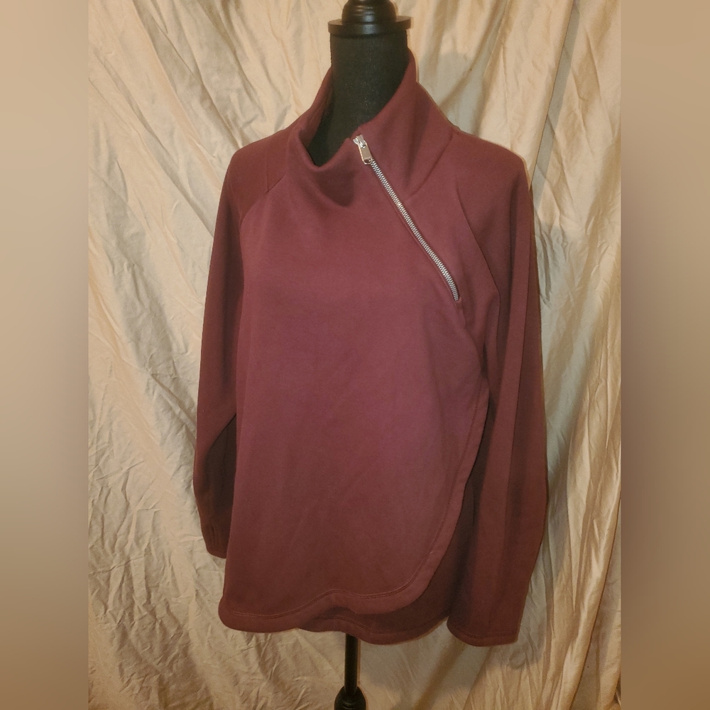 Athleta fleece lined sweatshirt with long sleeves and zip neck